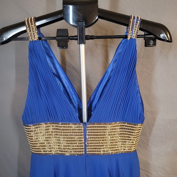 Elegant Blue Evening Gown with Gold Beading by Scala - Picture 6 of 16